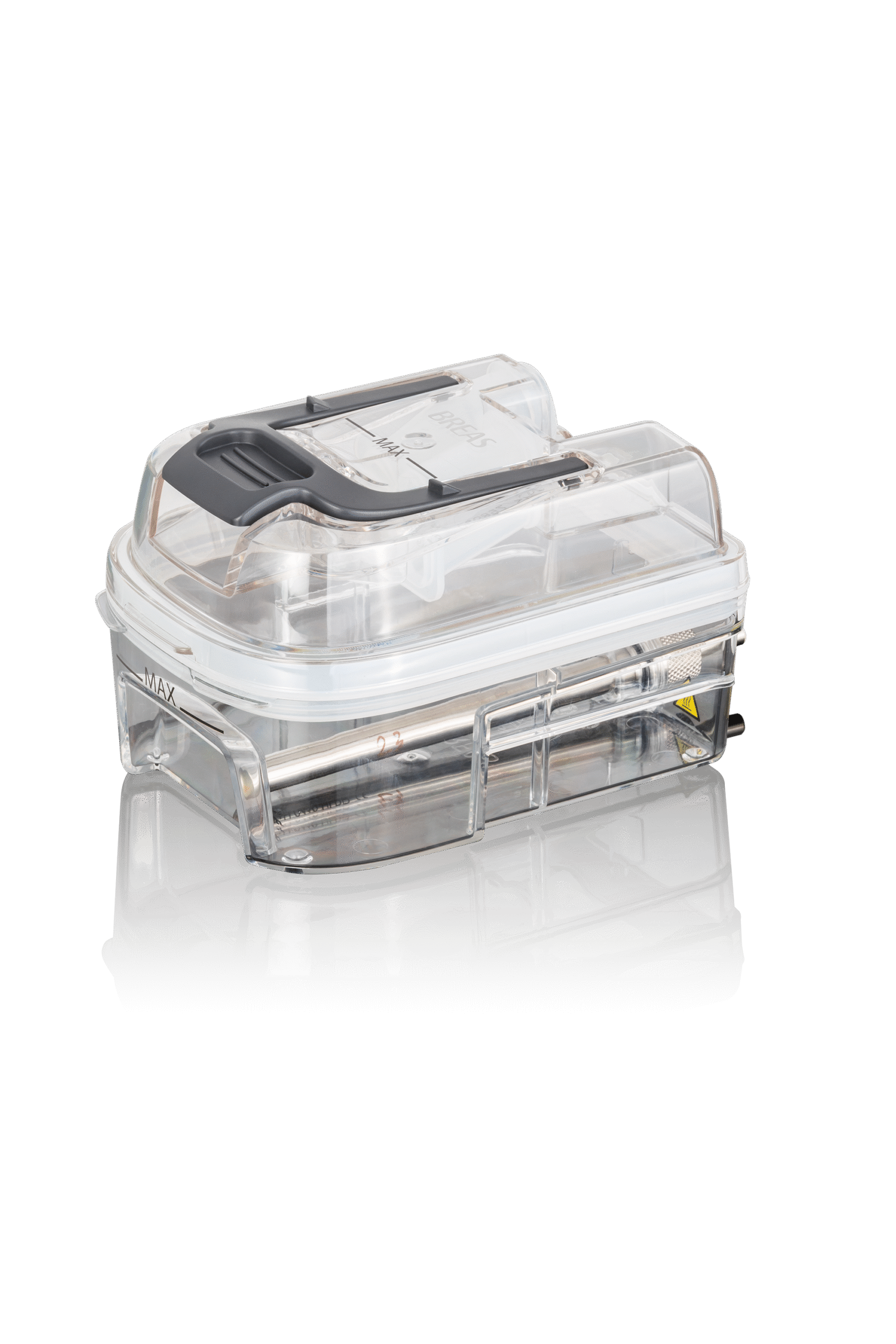 Transparent plastvattenkammare med svart handtag, används i CPAP-maskiner för befuktningsterapi.